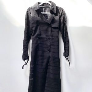 Black trench coat with sheer detailing